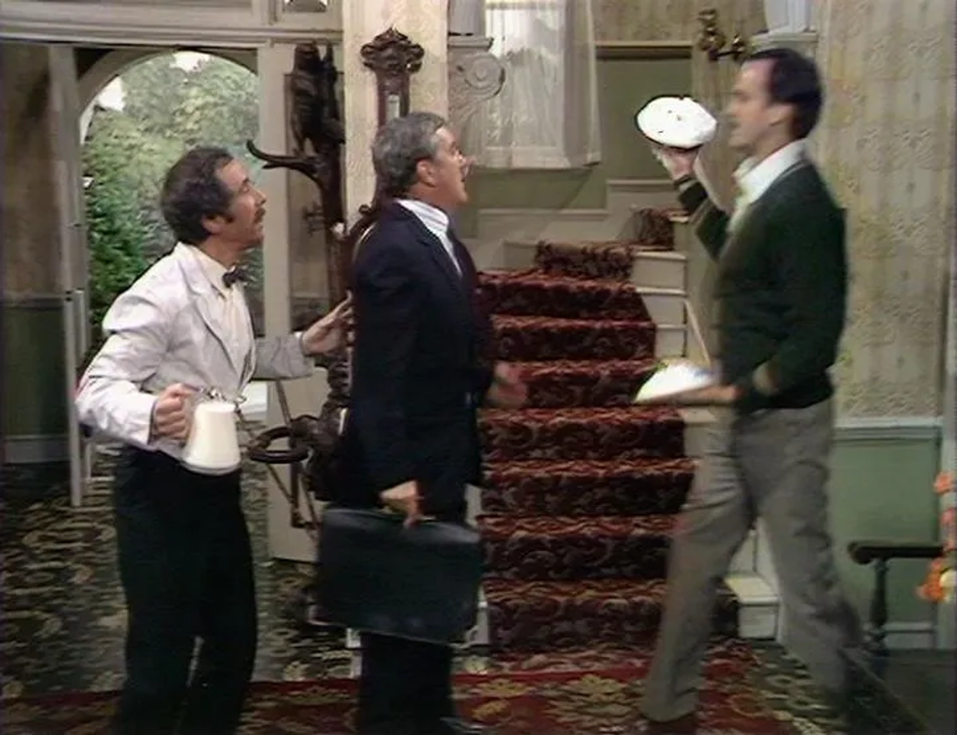 John Cleese, Bernard Cribbins, and Andrew Sachs in Fawlty Towers (1975)