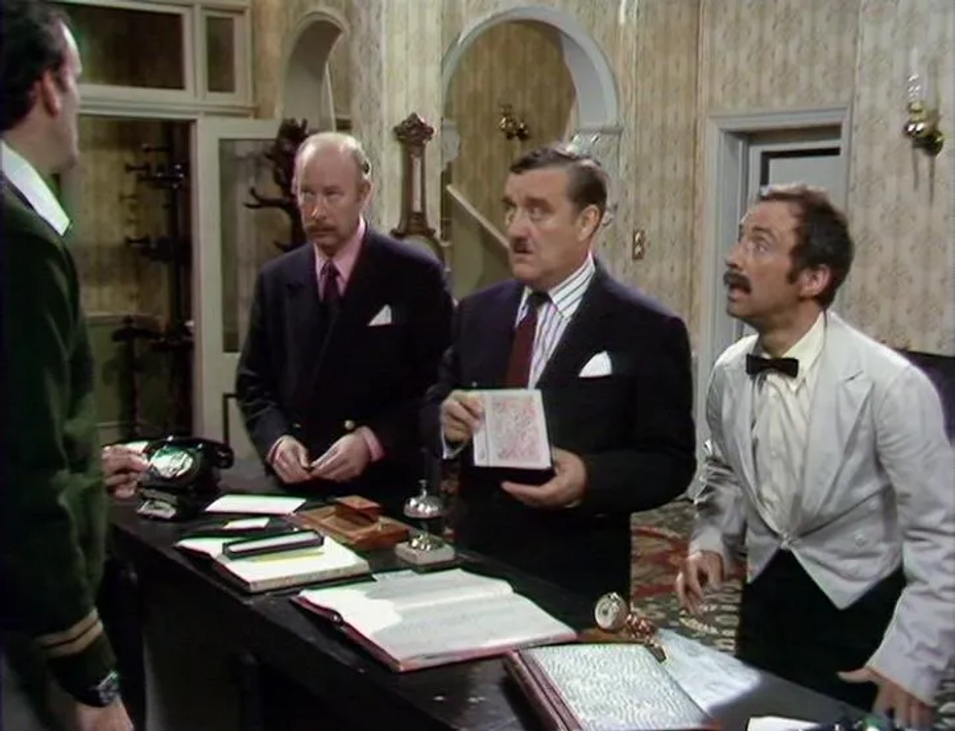 John Cleese, James Cossins, Bernard Cribbins, and Andrew Sachs in Fawlty Towers (1975)