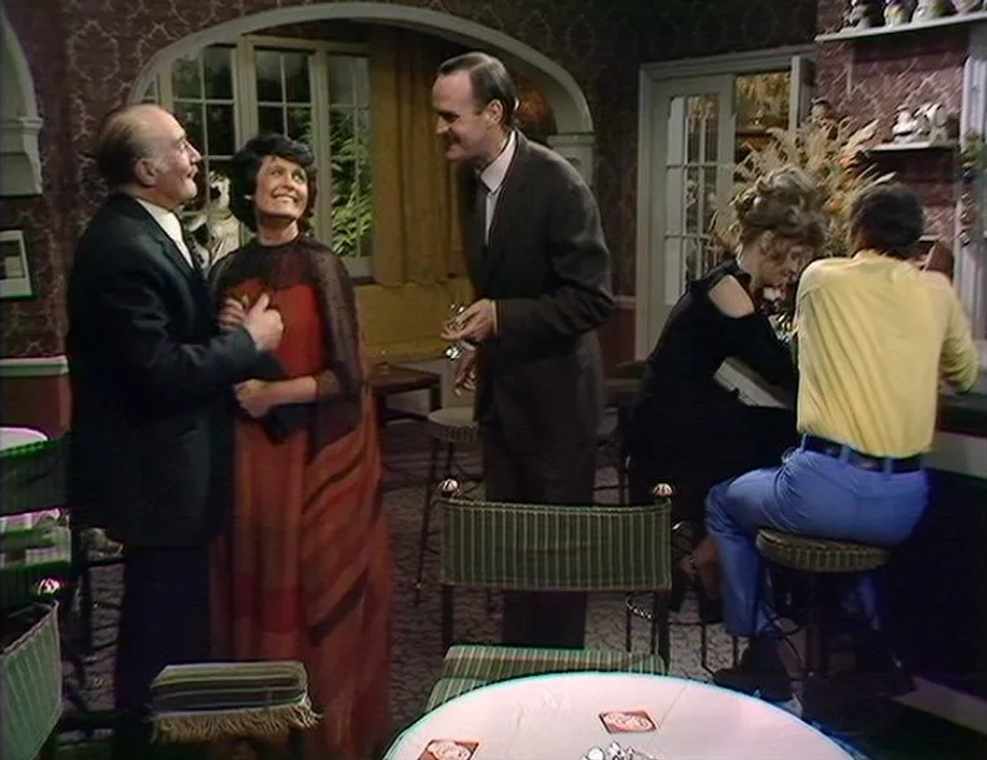 John Cleese, Ballard Berkeley, Yvonne Gilan, and Prunella Scales in Fawlty Towers (1975)