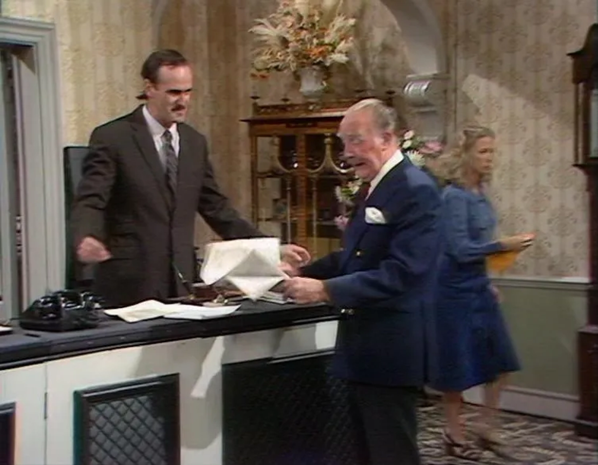 John Cleese, Ballard Berkeley, and Connie Booth in Fawlty Towers (1975)