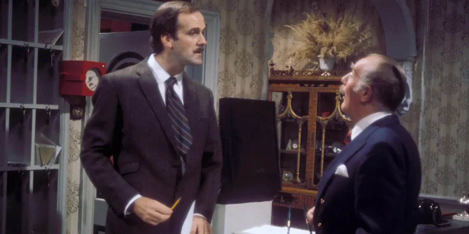 John Cleese and Ballard Berkeley in Fawlty Towers (1975)