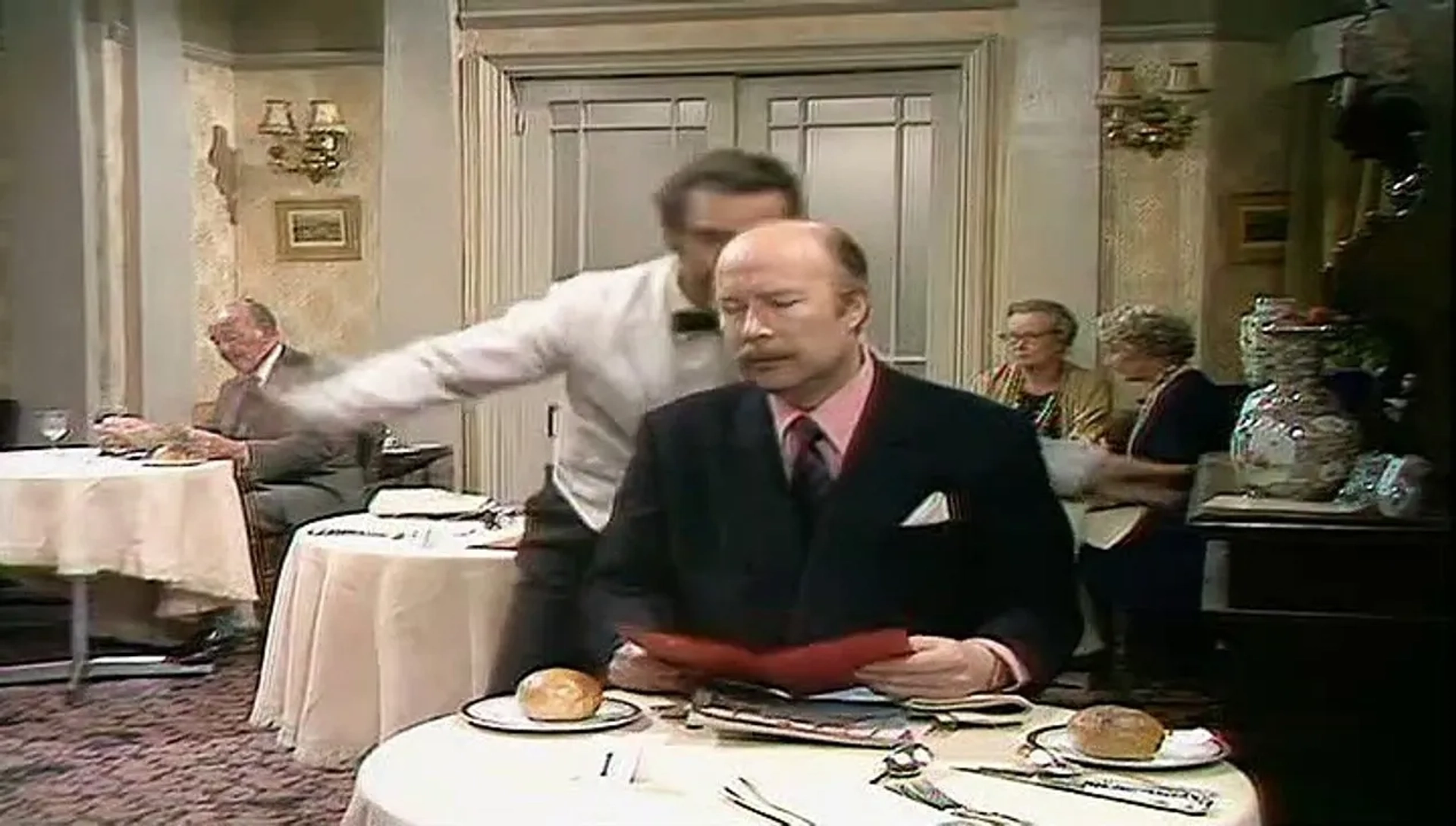 Ballard Berkeley, James Cossins, and Andrew Sachs in Fawlty Towers (1975)