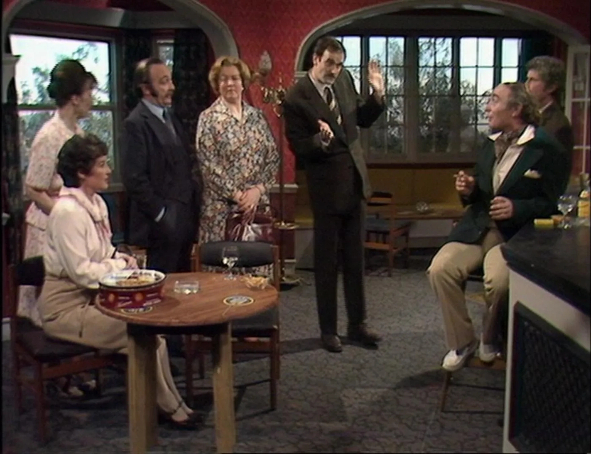 John Cleese, Robert Arnold, Ken Campbell, Roger Hume, Pat Keen, Denyse Alexander, and Una Stubbs in Fawlty Towers (1975)