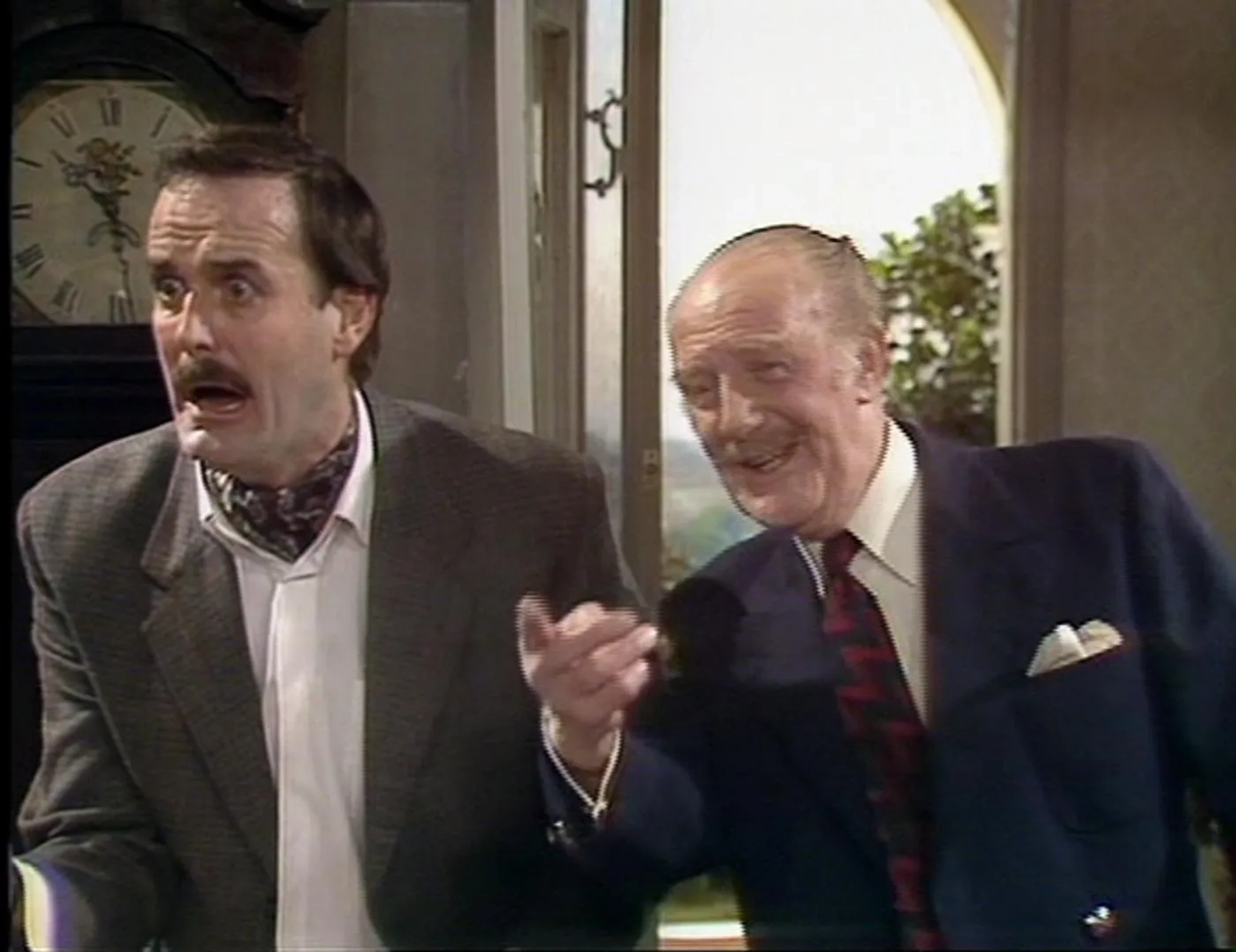 John Cleese and Ballard Berkeley in Fawlty Towers (1975)