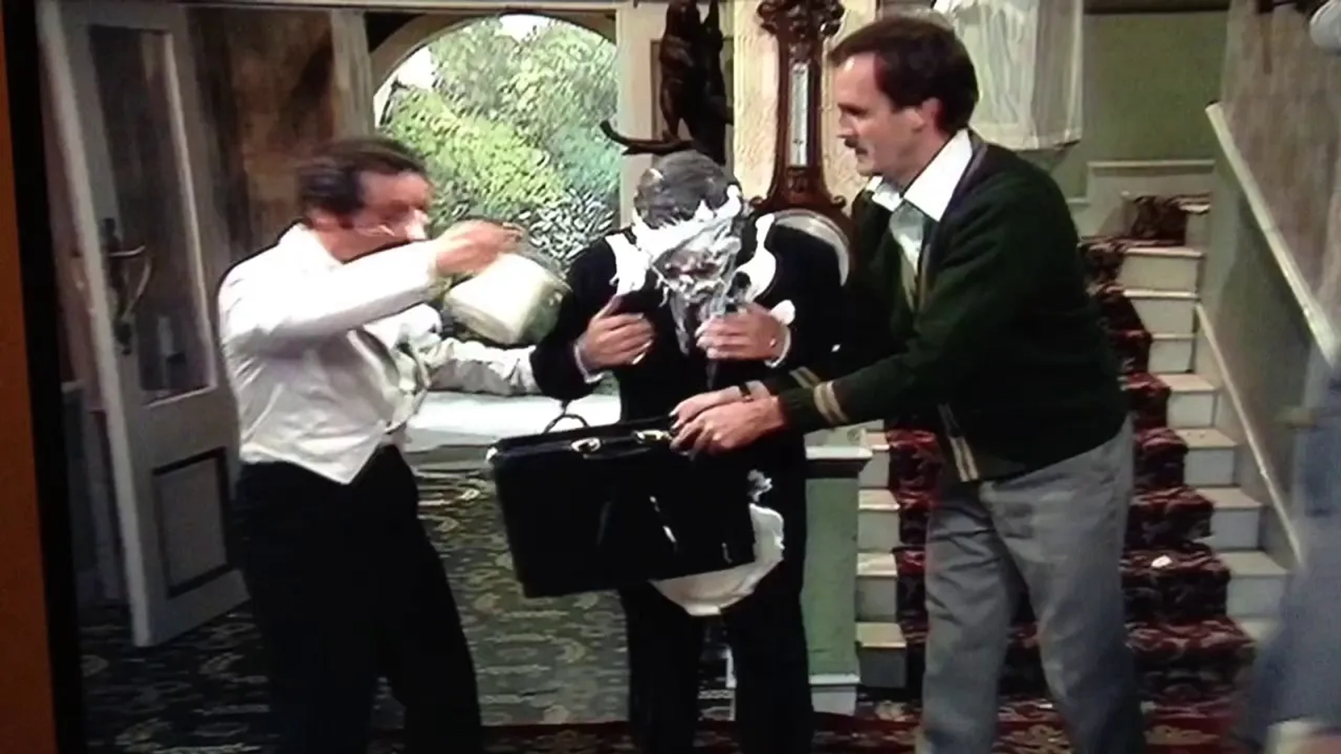 John Cleese, Bernard Cribbins, and Andrew Sachs in Fawlty Towers (1975)