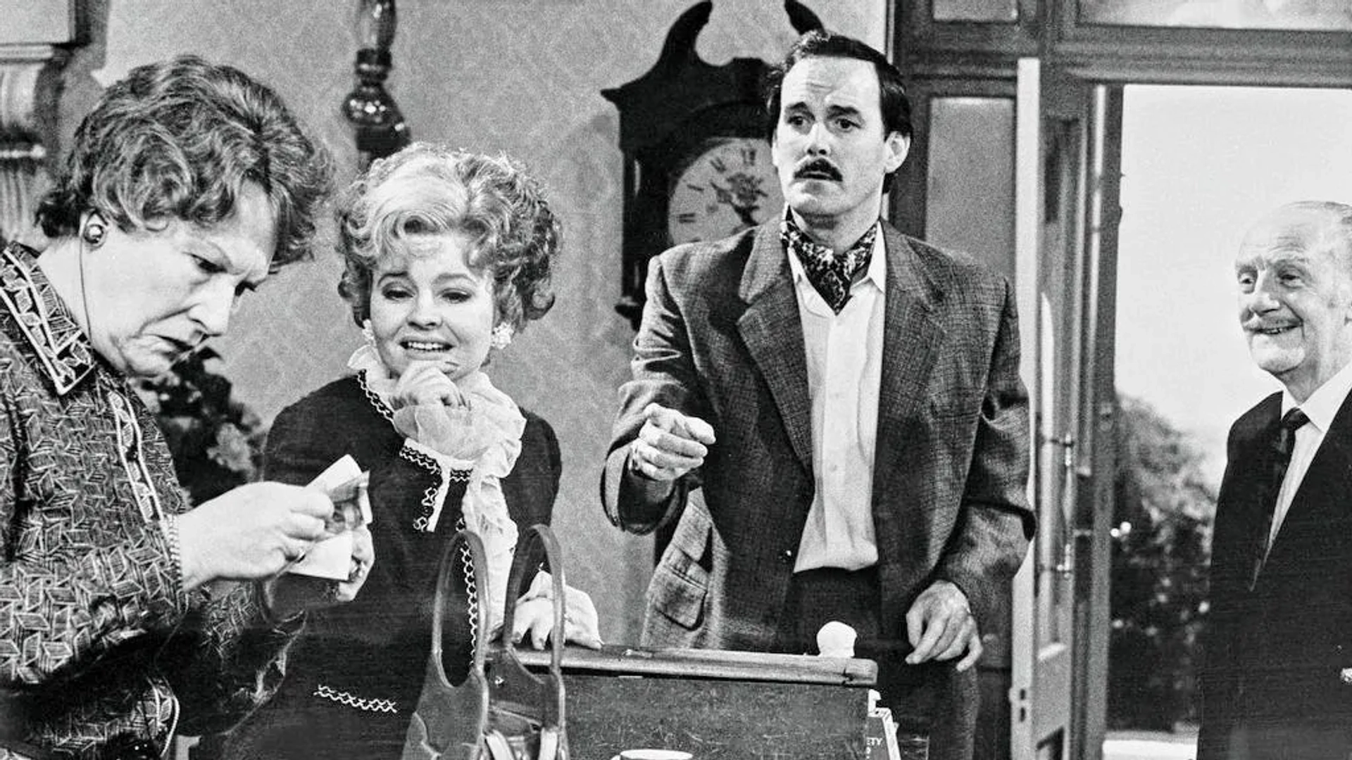 John Cleese, Ballard Berkeley, Joan Sanderson, and Prunella Scales in Fawlty Towers (1975)