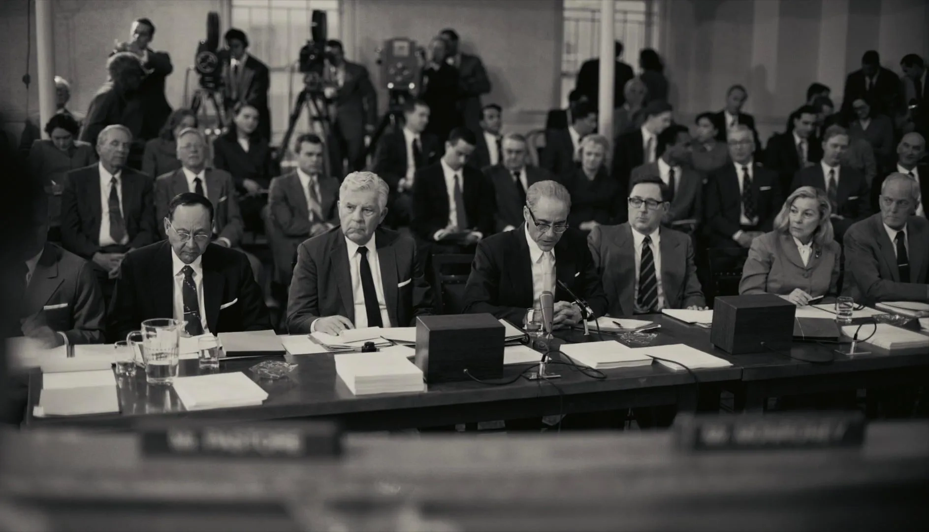 Robert Downey Jr. and Scott Grimes in Oppenheimer (2023)