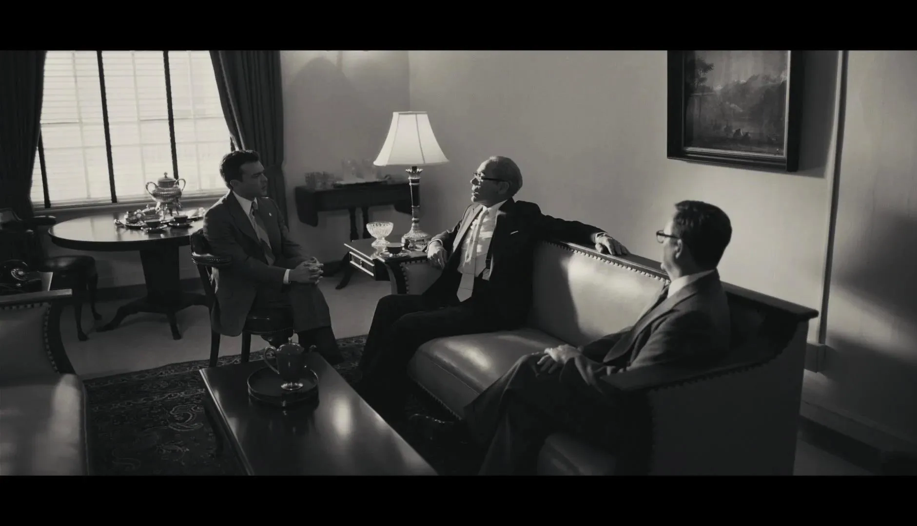 Robert Downey Jr. and Alden Ehrenreich in Oppenheimer (2023)