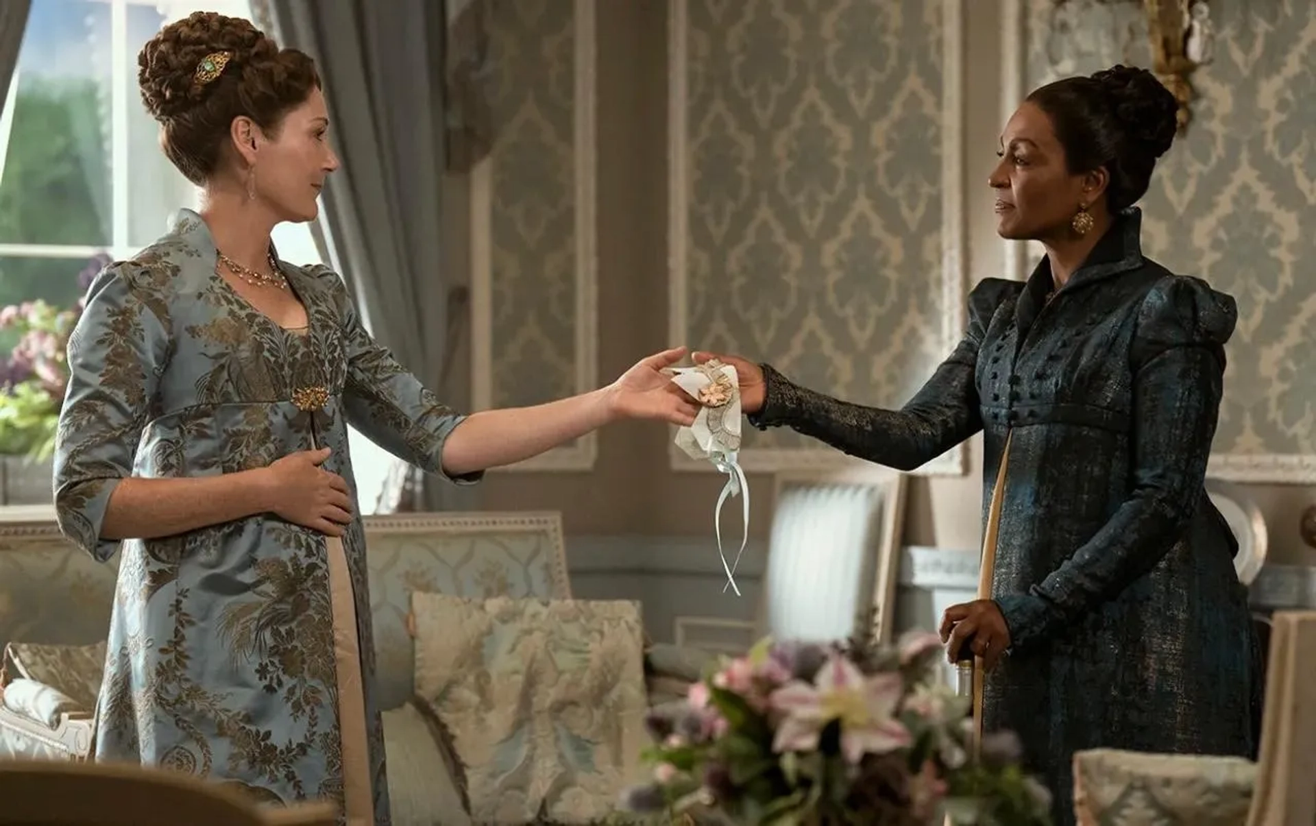 Adjoa Andoh and Ruth Gemmell in Queen Charlotte: A Bridgerton Story (2023)