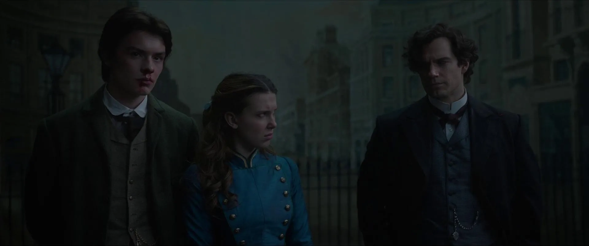 Henry Cavill, Millie Bobby Brown, and Louis Partridge in Enola Holmes 2 (2022)