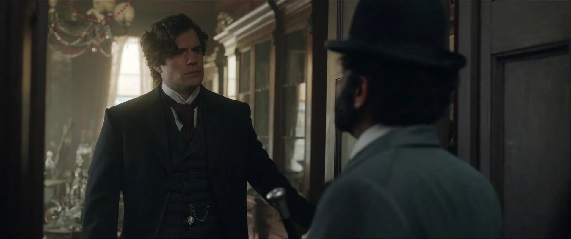 Henry Cavill and Adeel Akhtar in Enola Holmes 2 (2022)