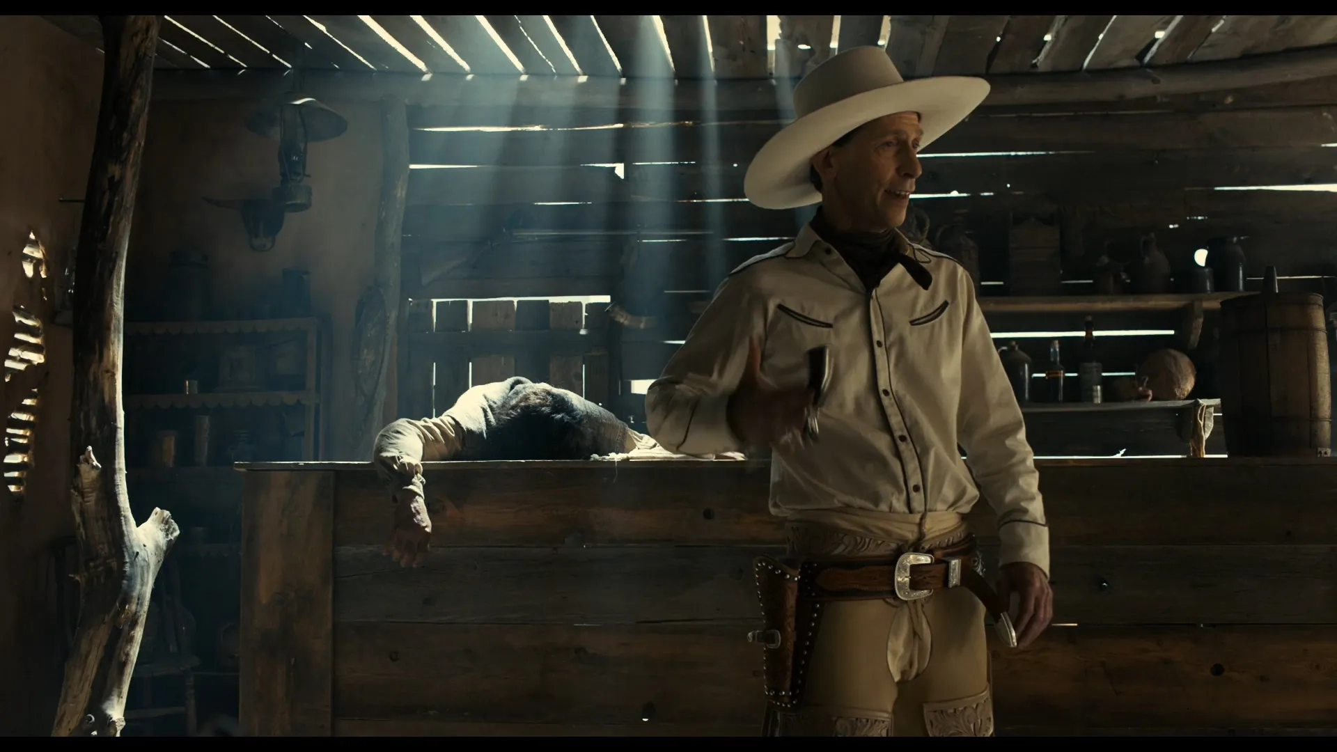 Tim Blake Nelson and Alejandro Patiño in The Ballad of Buster Scruggs (2018)