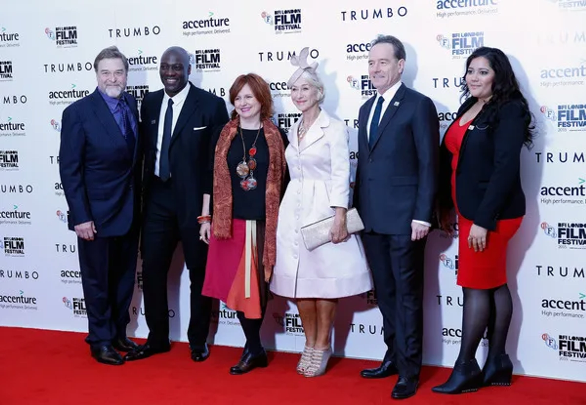 Actors John Goodman, Adewale Akinnuoye-Agbaje, festival director Clare Stewart and actors Helen Mirren, Bryan Cranston and guest attend the "Trumbo" premiere during the BFI London Film Festival at the Odeon Leicester Square on October 8, 2015 in London...