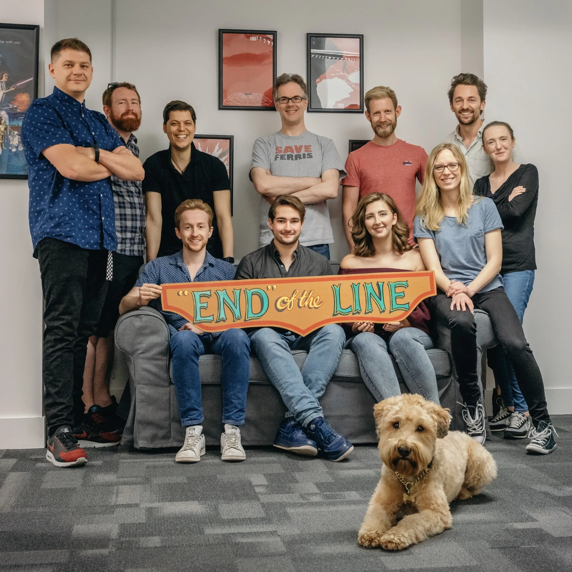 Some of the Fallout Post Team. Back row: Chris Hunter (3D Editor), Ben Mills (VFX Editor), Riccardo Bacigalupo (1st Assistant Editor), Eddie Hamilton (Editor), Tom Coope (1st Assistant Editor), Robbie Gibbon (VFX Editor), Nicola Ford (3D Co-Ordinator). Front row: Ryan Axe (2nd Assistant Editor), Christopher Frith (2nd Assistant Editor), Hannah Leckey (Trainee Assistant Editor), Cécile Tournesac (Music Editor). Floor: Stanley Kojima (Post Production Canine Support.