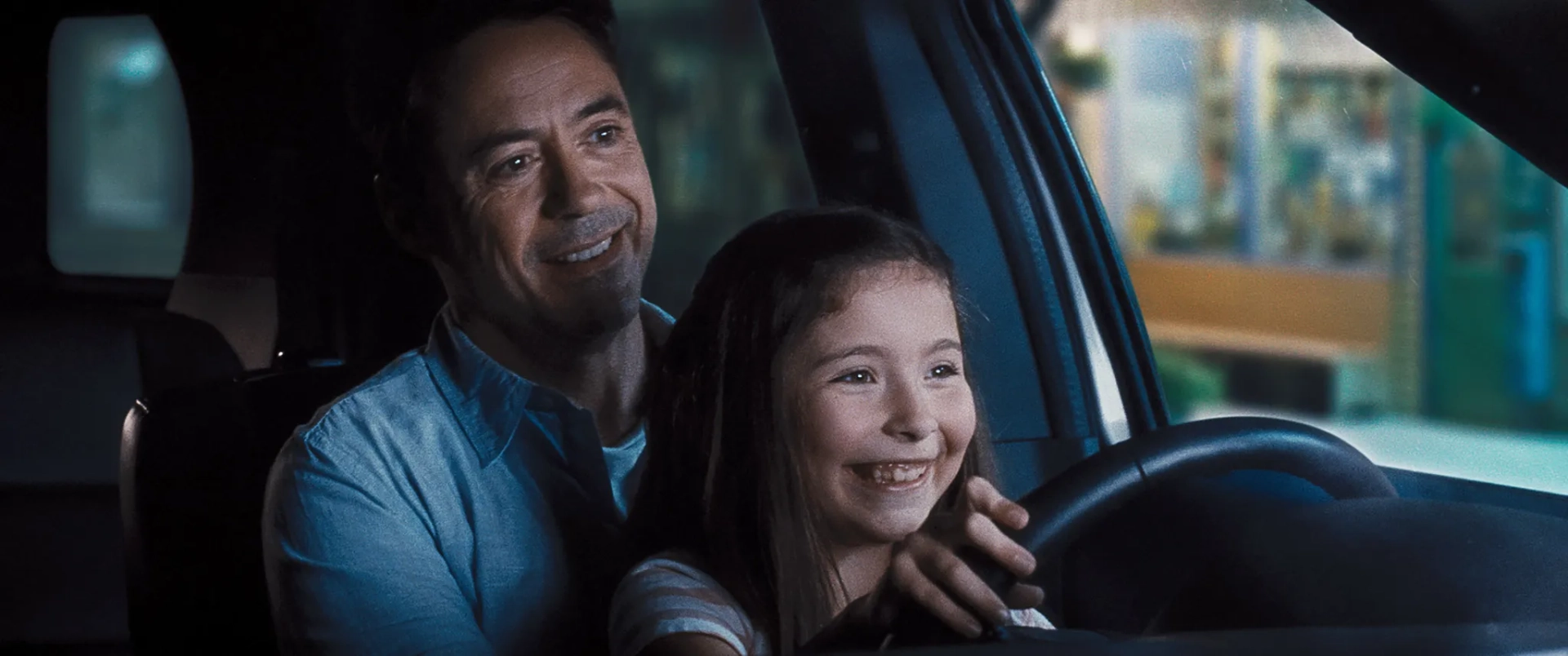 Robert Downey Jr. and Emma Tremblay in The Judge (2014)