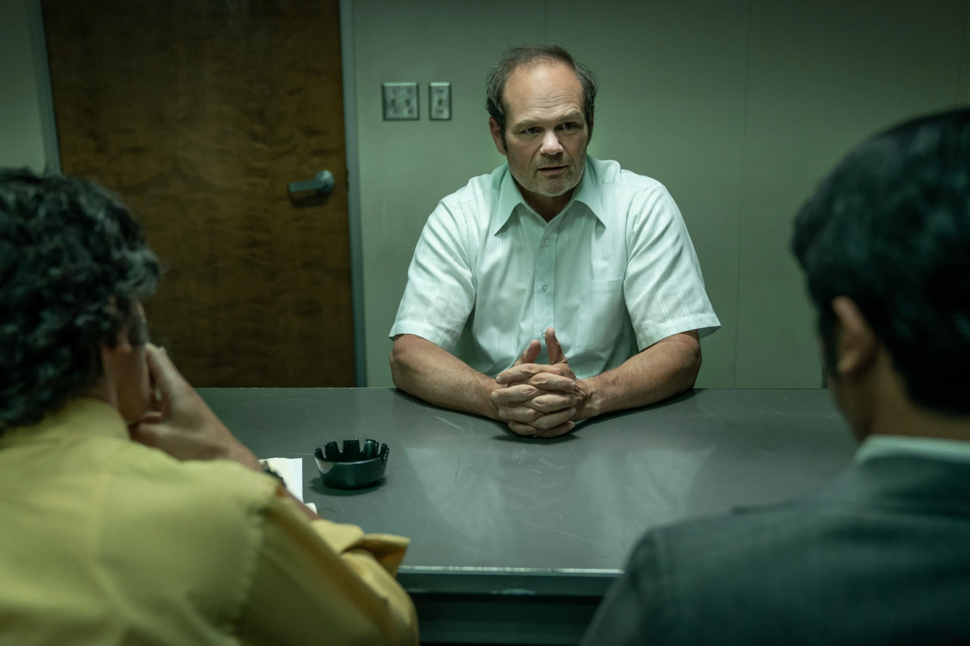 Chris Bauer, Chris Messina, and Carlos Valdes in Gaslit (2022)