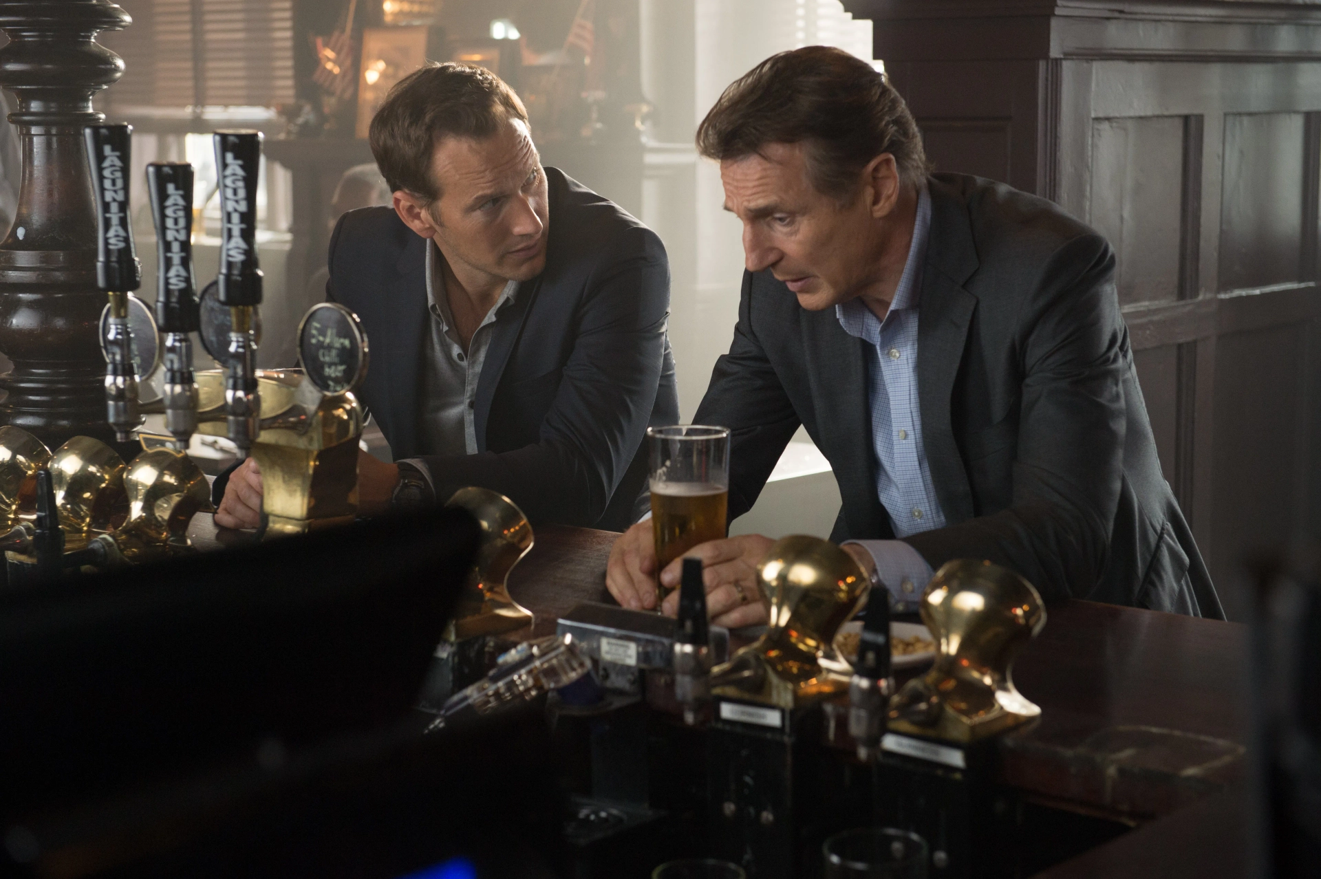 Liam Neeson and Patrick Wilson in The Commuter (2018)