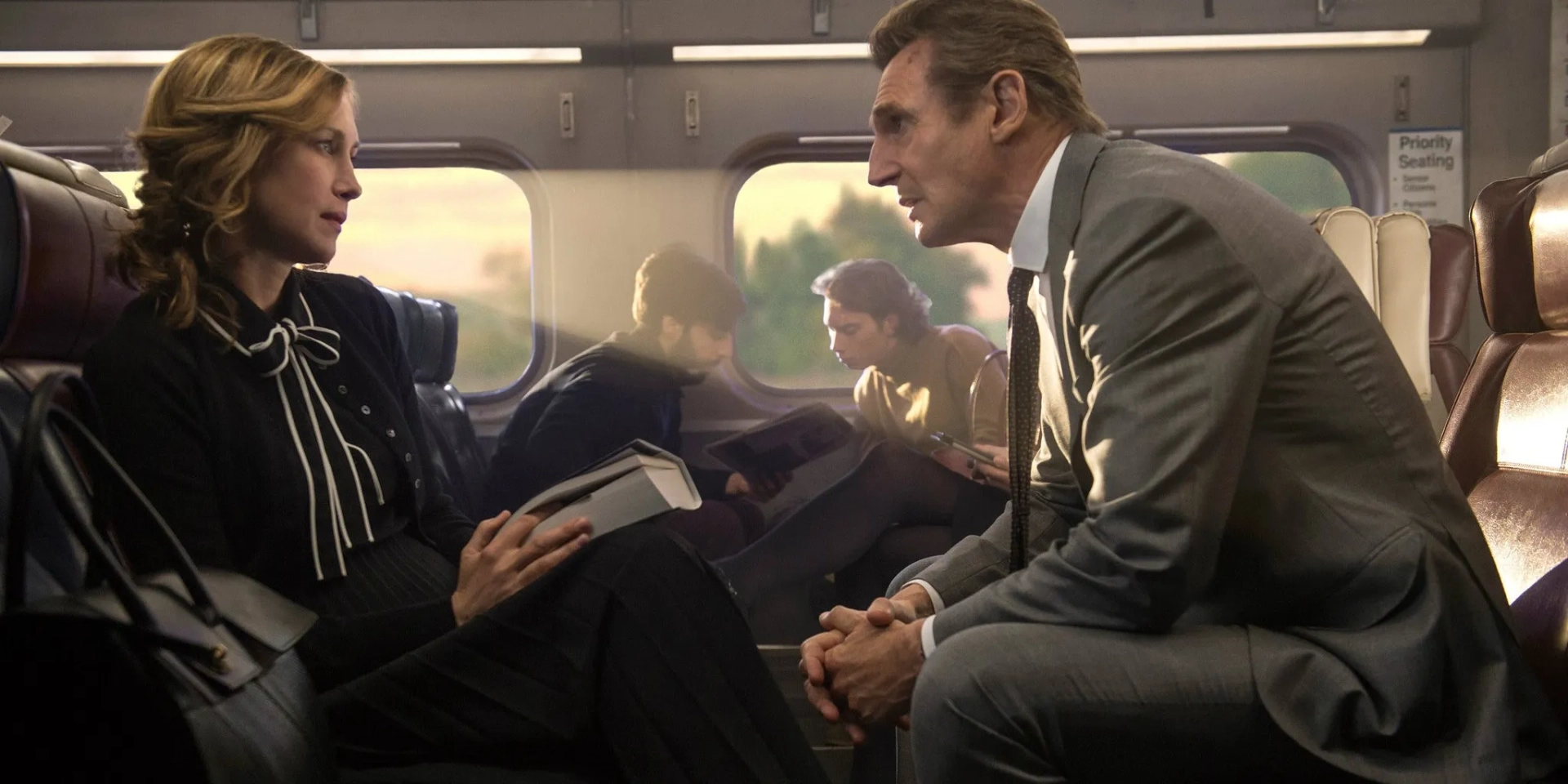 Liam Neeson and Vera Farmiga in The Commuter (2018)