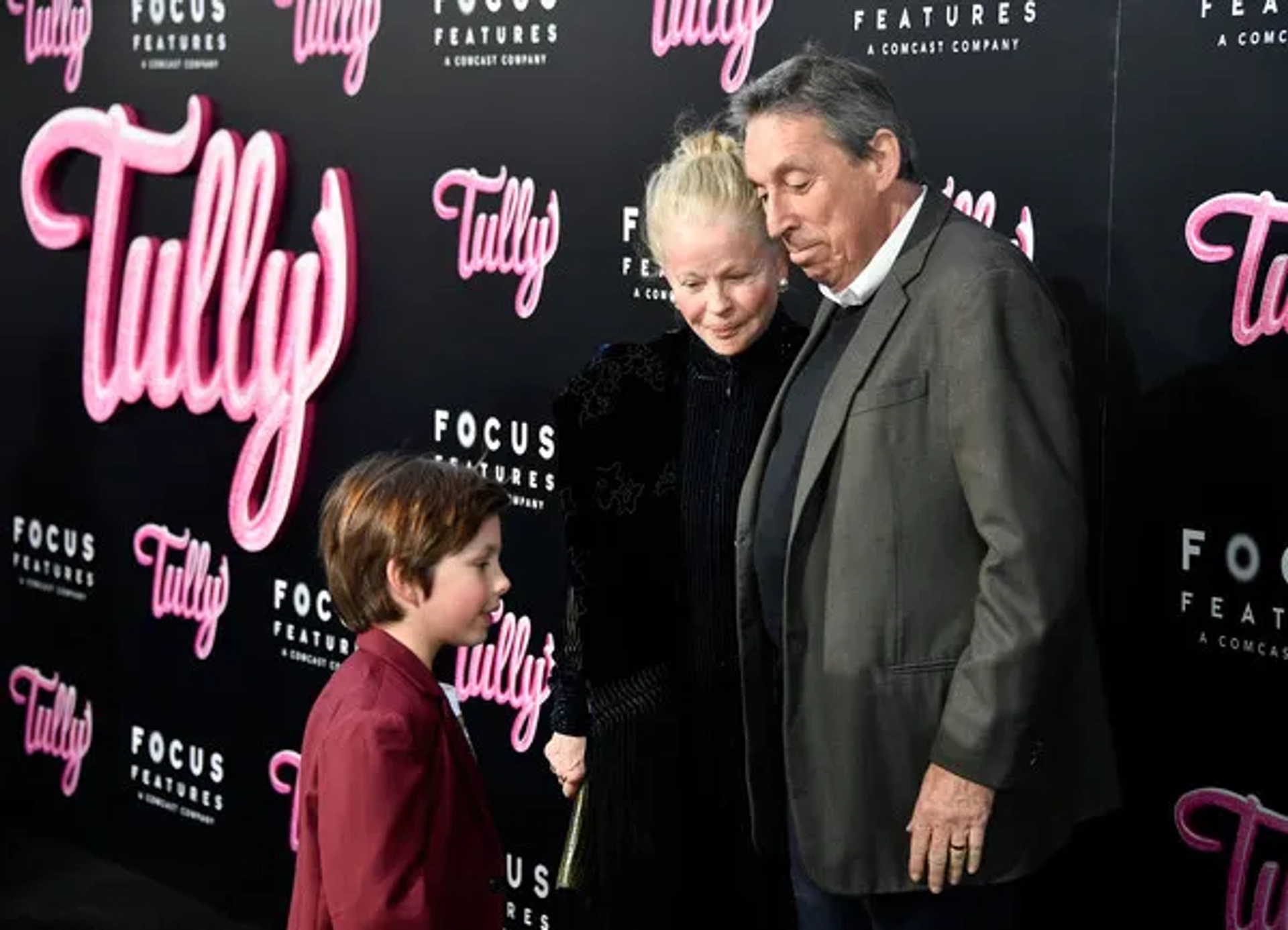 (L-R) Asher Miles Fallica, Genevieve Robert, and Ivan Reitman attend the premiere of Focus Features' "Tully" at Regal LA Live Stadium 14 on April 18, 2018 in Los Angeles, California.