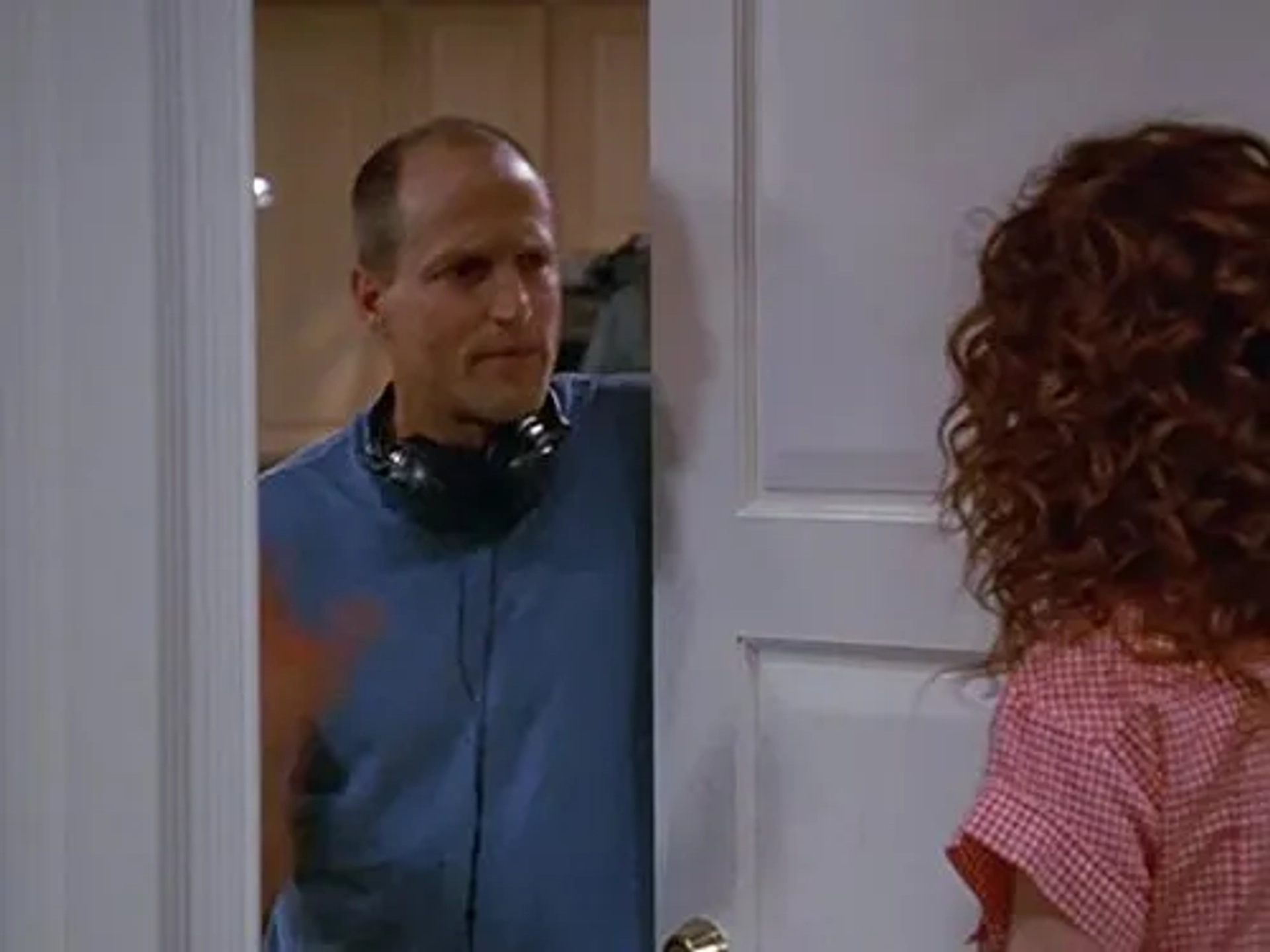 Woody Harrelson and Debra Messing in Will & Grace (1998)