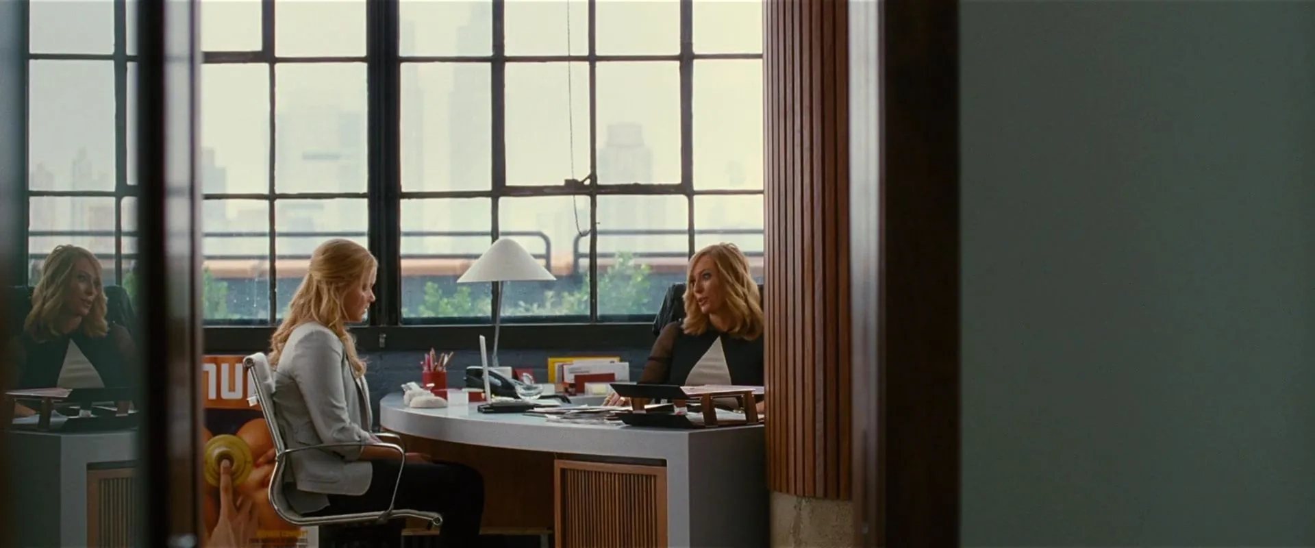 Tilda Swinton and Amy Schumer in Trainwreck (2015)