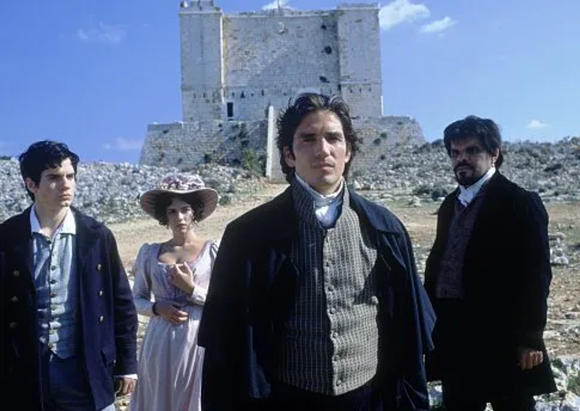 Jim Caviezel, Henry Cavill, Dagmara Dominczyk, and Luis Guzmán in The Count of Monte Cristo (2002)