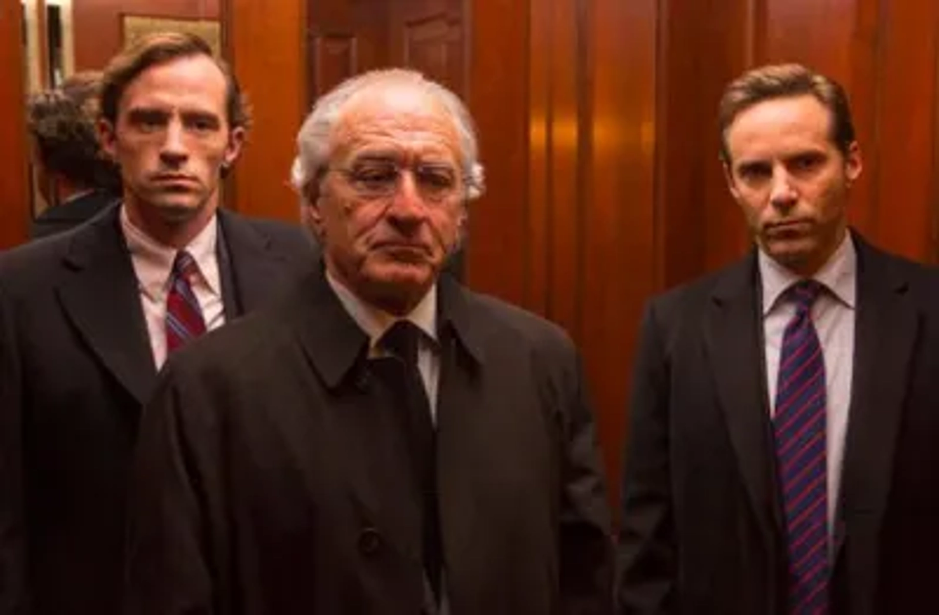 Robert De Niro, Alessandro Nivola, and Nathan Darrow in The Wizard of Lies (2017)