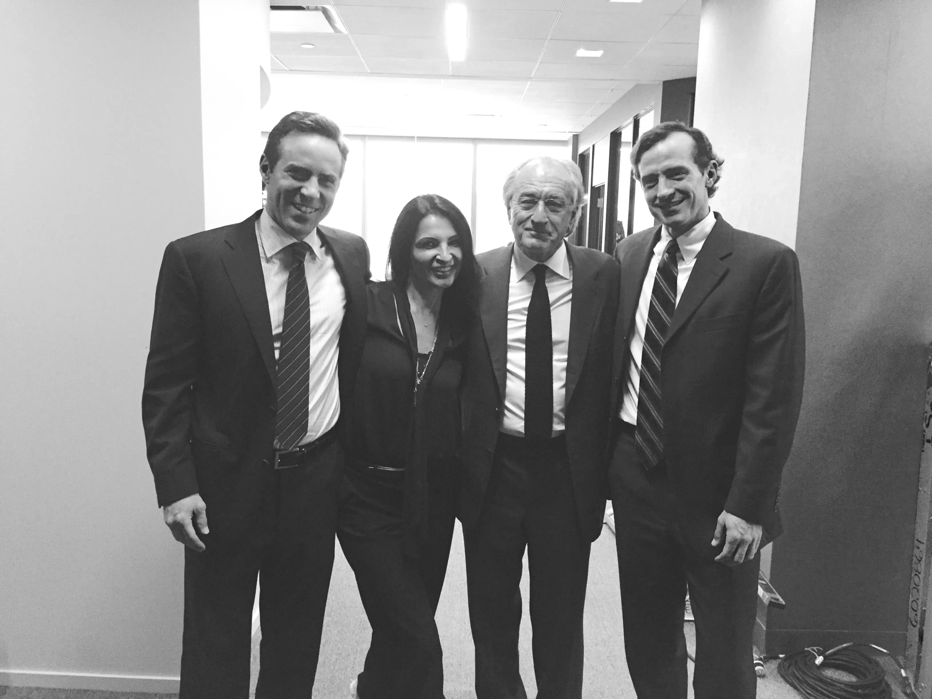 on set of Wizard Of Lies Alessandro Nivola,Kathrine Narducci,Robert Deniro,Nathan Darrow