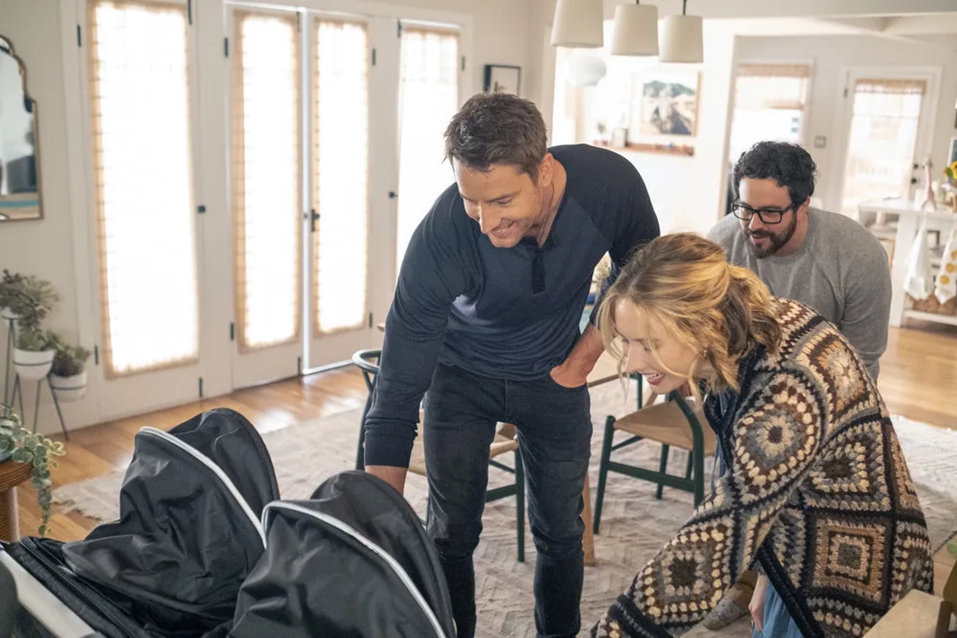 Justin Hartley, Adam Korson, and Caitlin Thompson in This Is Us: Heart and Soul (2022)