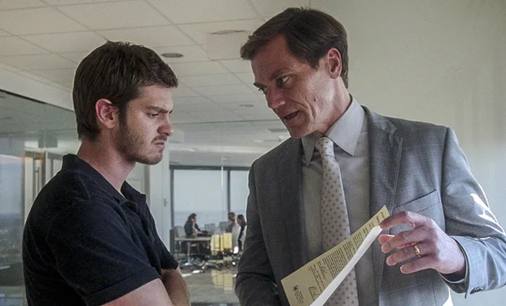 Michael Shannon and Andrew Garfield in 99 Homes (2014)