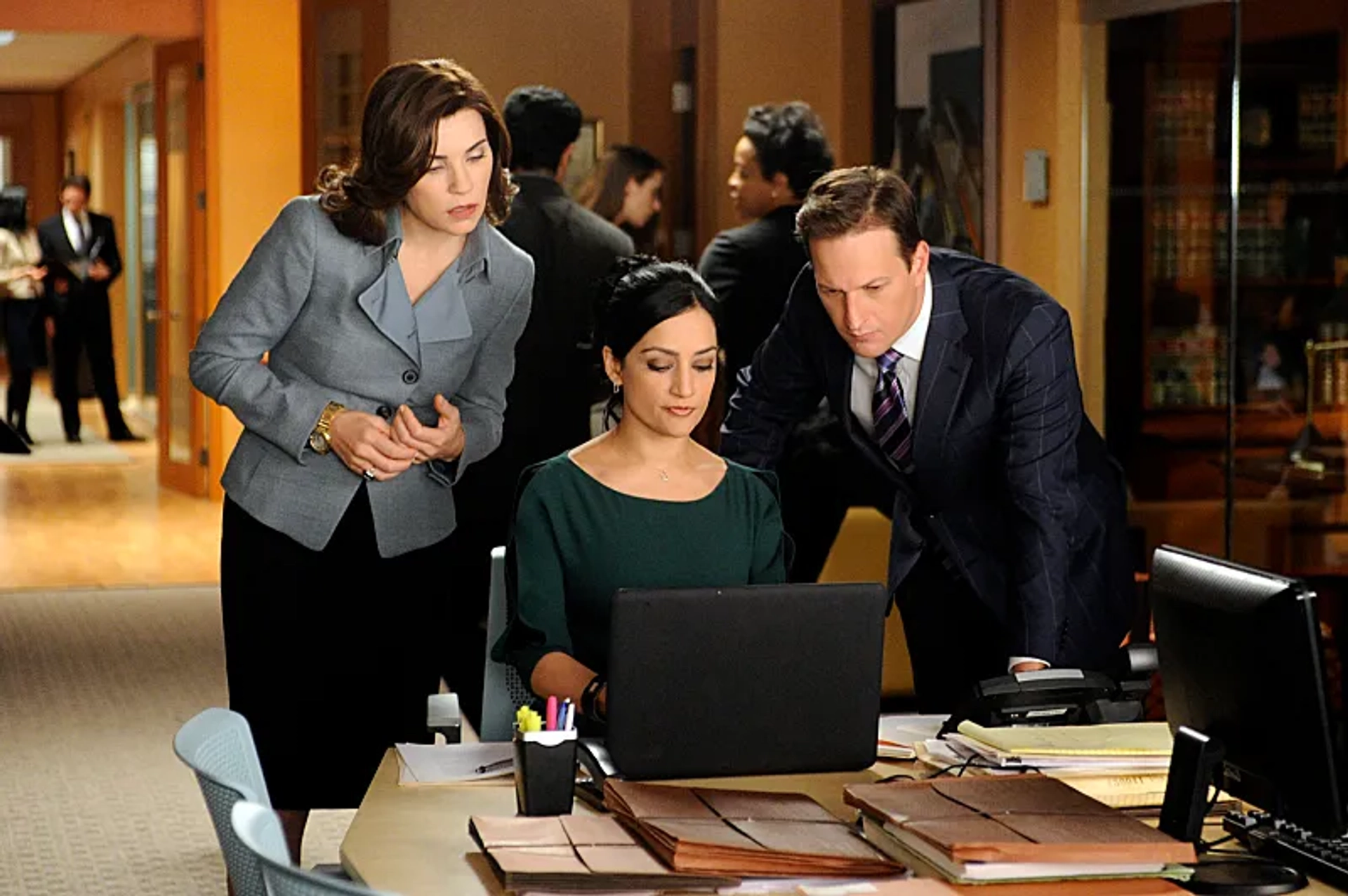 Julianna Margulies, Josh Charles, and Archie Panjabi in The Good Wife (2009)