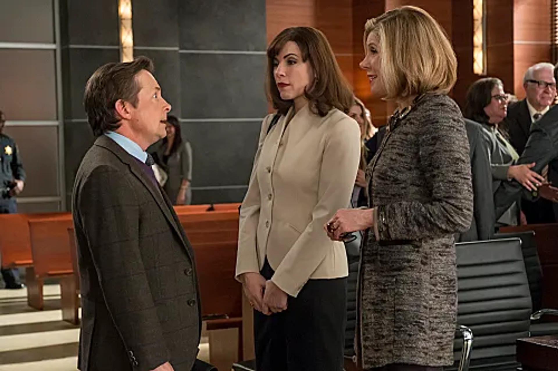 Michael J. Fox, Julianna Margulies, and Christine Baranski in The Good Wife (2009)