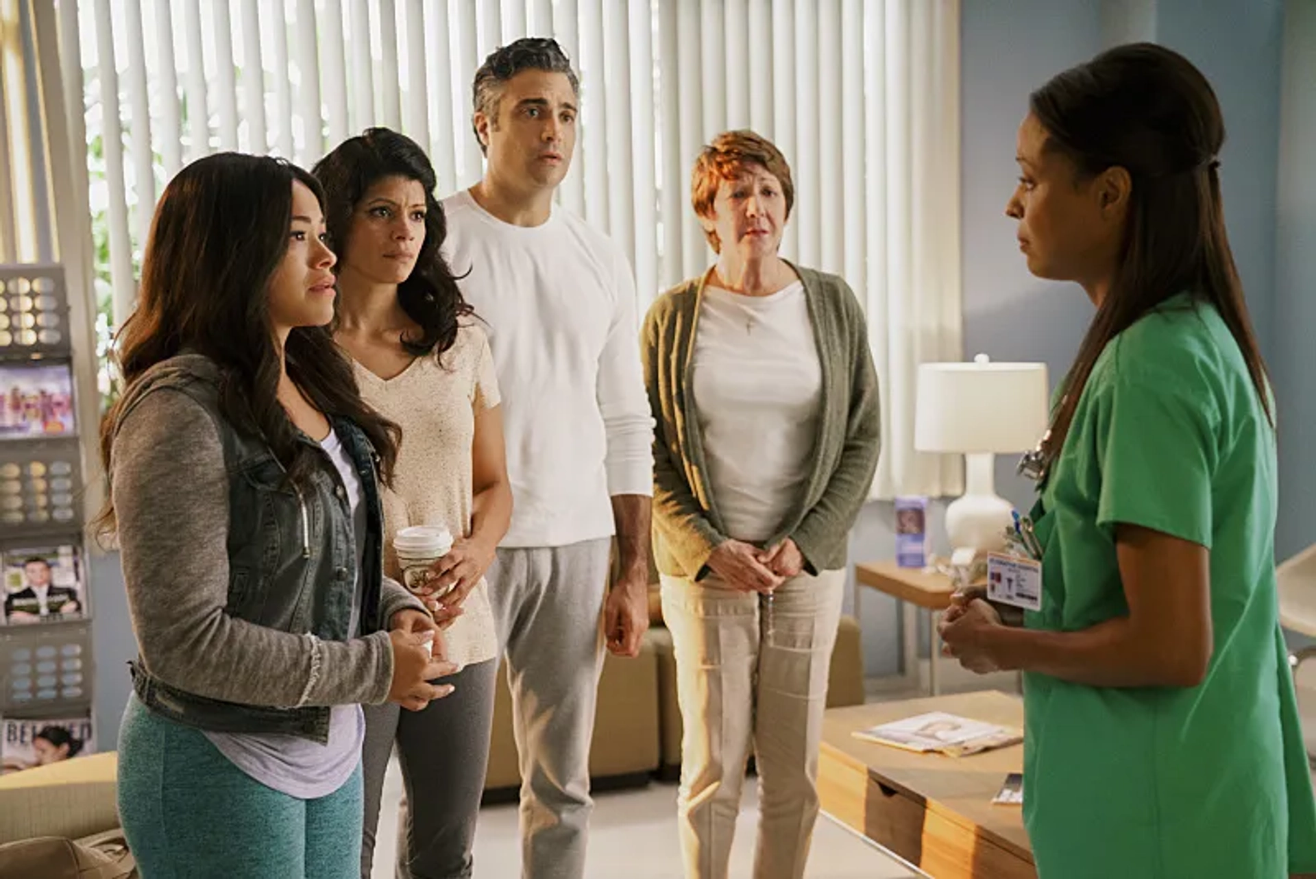 Jaime Camil, Ivonne Coll, Andrea Navedo, and Gina Rodriguez in Jane the Virgin (2014)