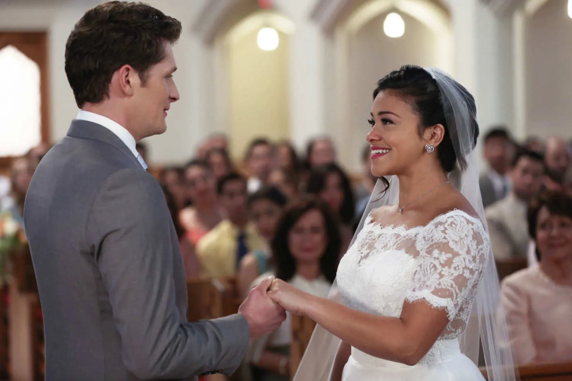 Gina Rodriguez and Brett Dier in Jane the Virgin (2014)