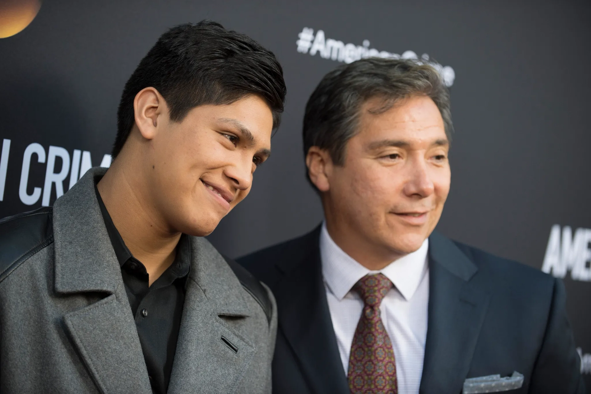 Benito Martinez and Johnny Ortiz at an event for American Crime (2015)