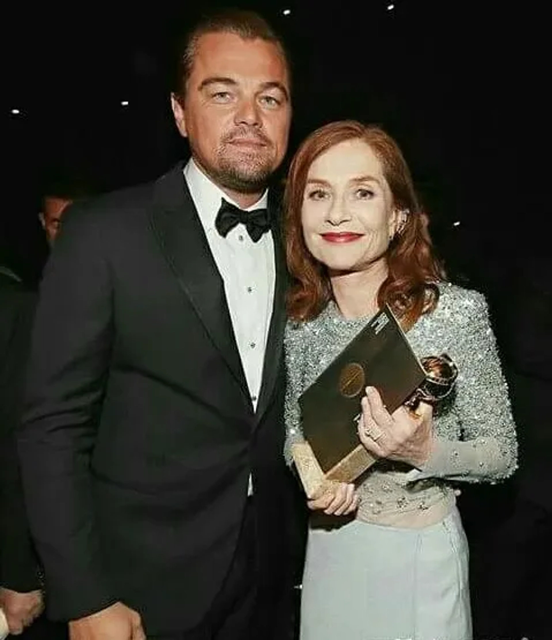 Leonardo DiCaprio and Isabelle Huppert at an event for Elle (2016)