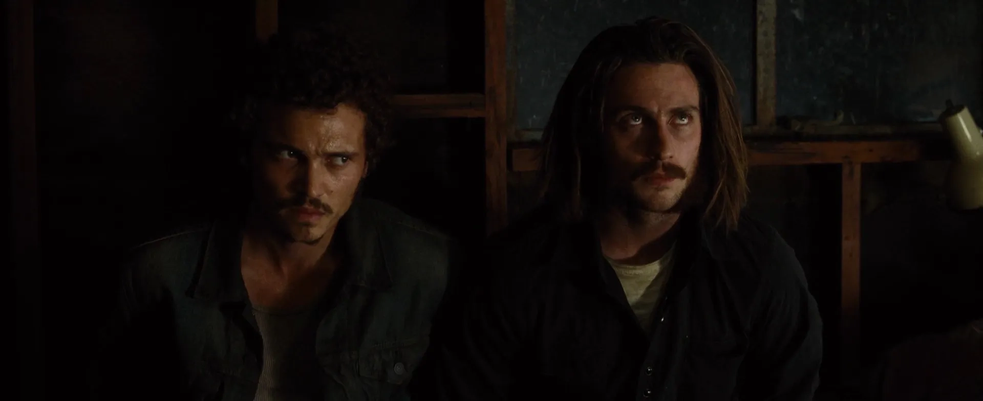 Aaron Taylor-Johnson and Karl Glusman in Nocturnal Animals (2016)