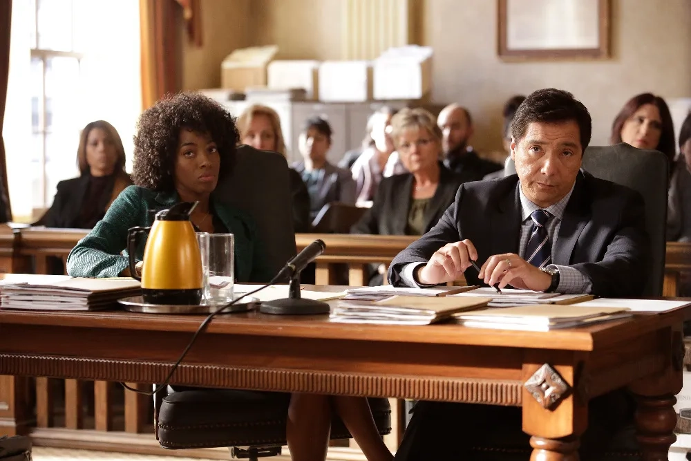 Benito Martinez and Milauna Jackson in How to Get Away with Murder (2014)