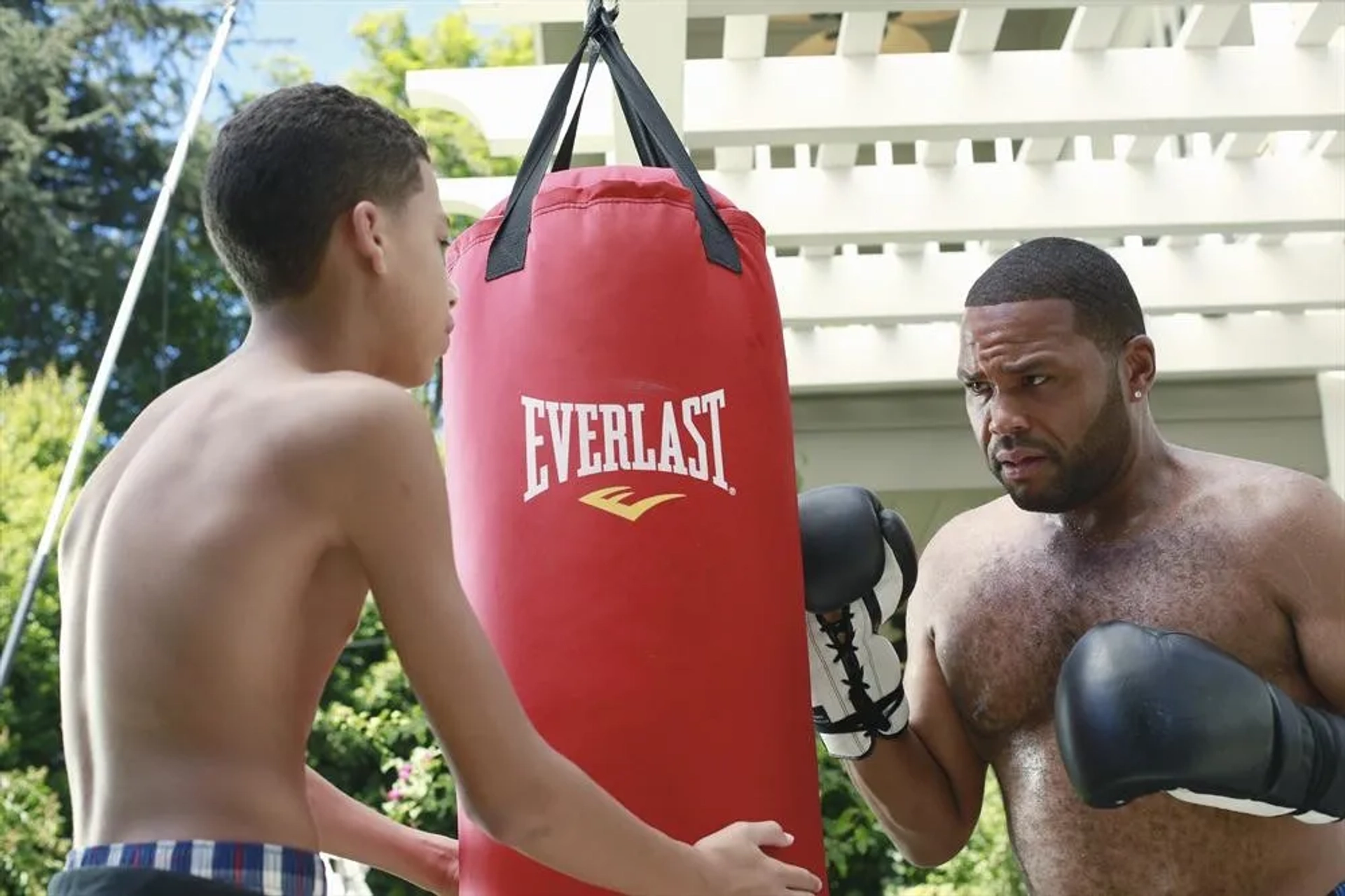 Anthony Anderson and Marcus Scribner in Black-ish (2014)