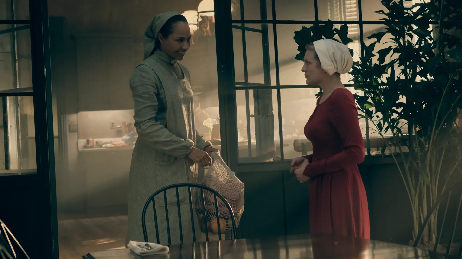 Elisabeth Moss and Amanda Brugel in The Handmaid's Tale (2017)