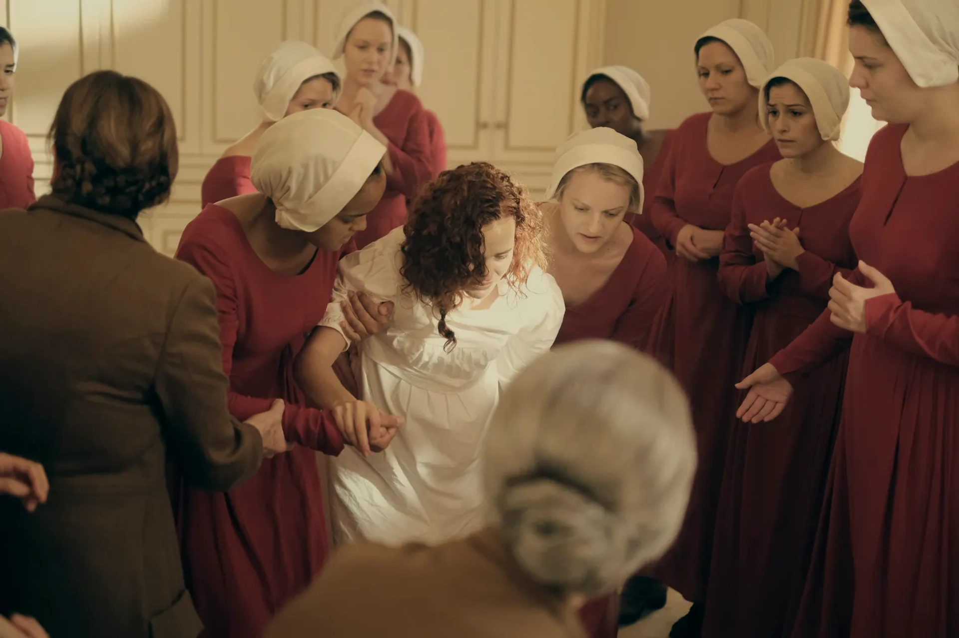 Elisabeth Moss, Ann Dowd, Madeline Brewer, and Bahia Watson in The Handmaid's Tale (2017)