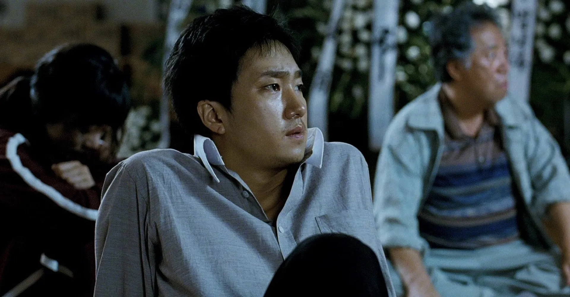 Bae Doona, Park Hae-il, and Byun Hee-Bong in The Host (2006)