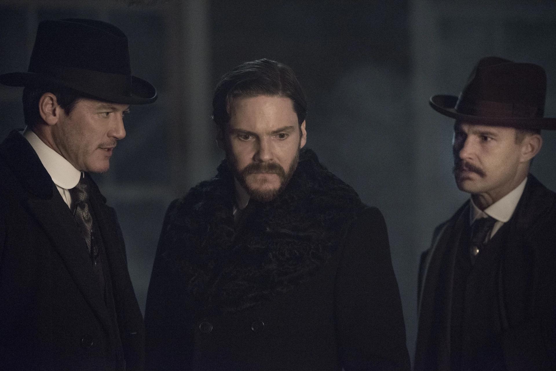 Daniel Brühl, Brian Geraghty, and Luke Evans in The Alienist (2018)