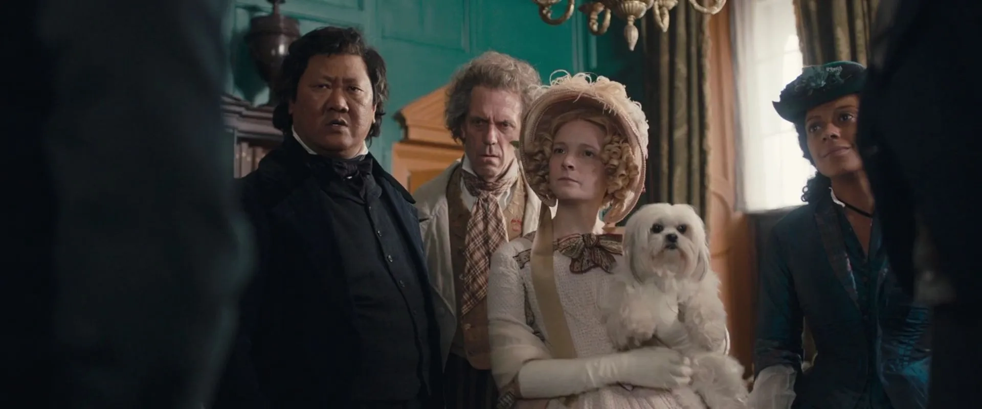 Hugh Laurie, Benedict Wong, Morfydd Clark, and Rosalind Eleazar in The Personal History of David Copperfield (2019)