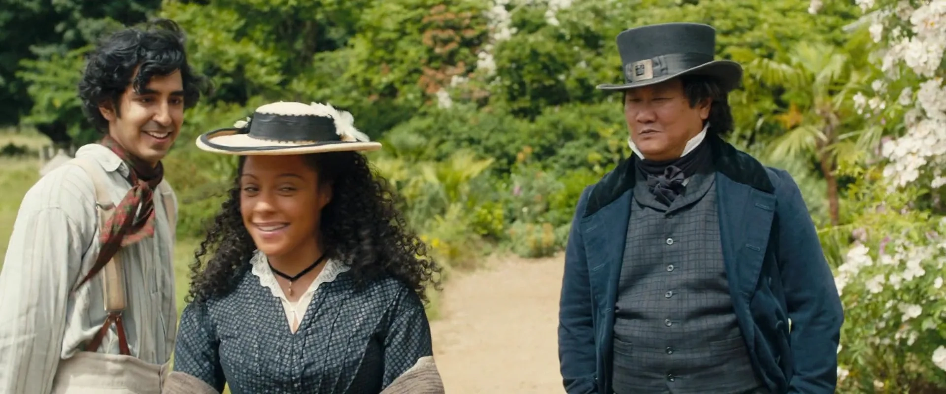 Benedict Wong, Dev Patel, and Rosalind Eleazar in The Personal History of David Copperfield (2019)