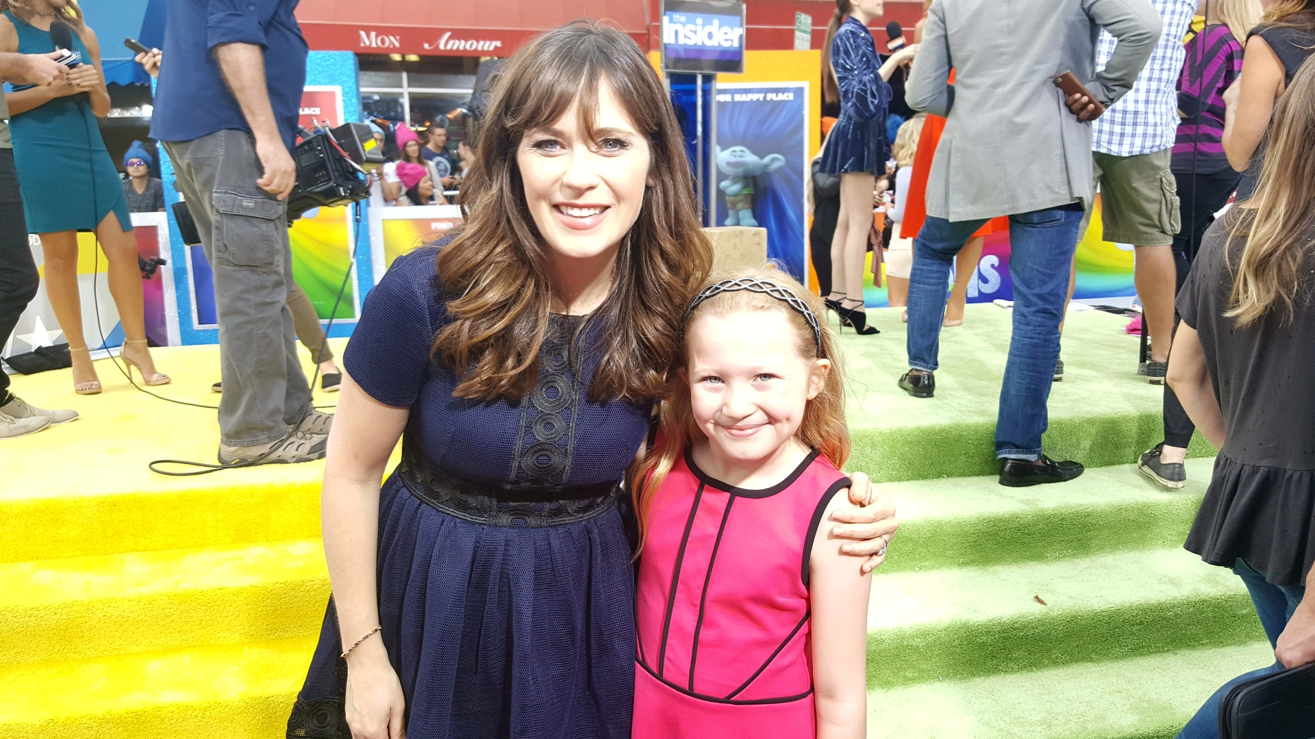 Abigail with Zooey Deschanel at red carpet premier of Trolls