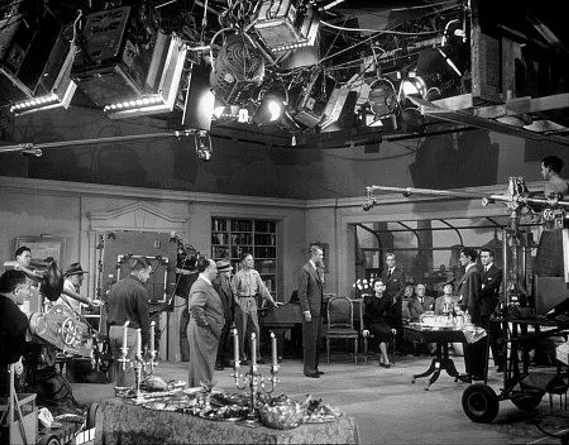 James Stewart, Alfred Hitchcock, and Cast on the set of "Rope." 1948 Warner