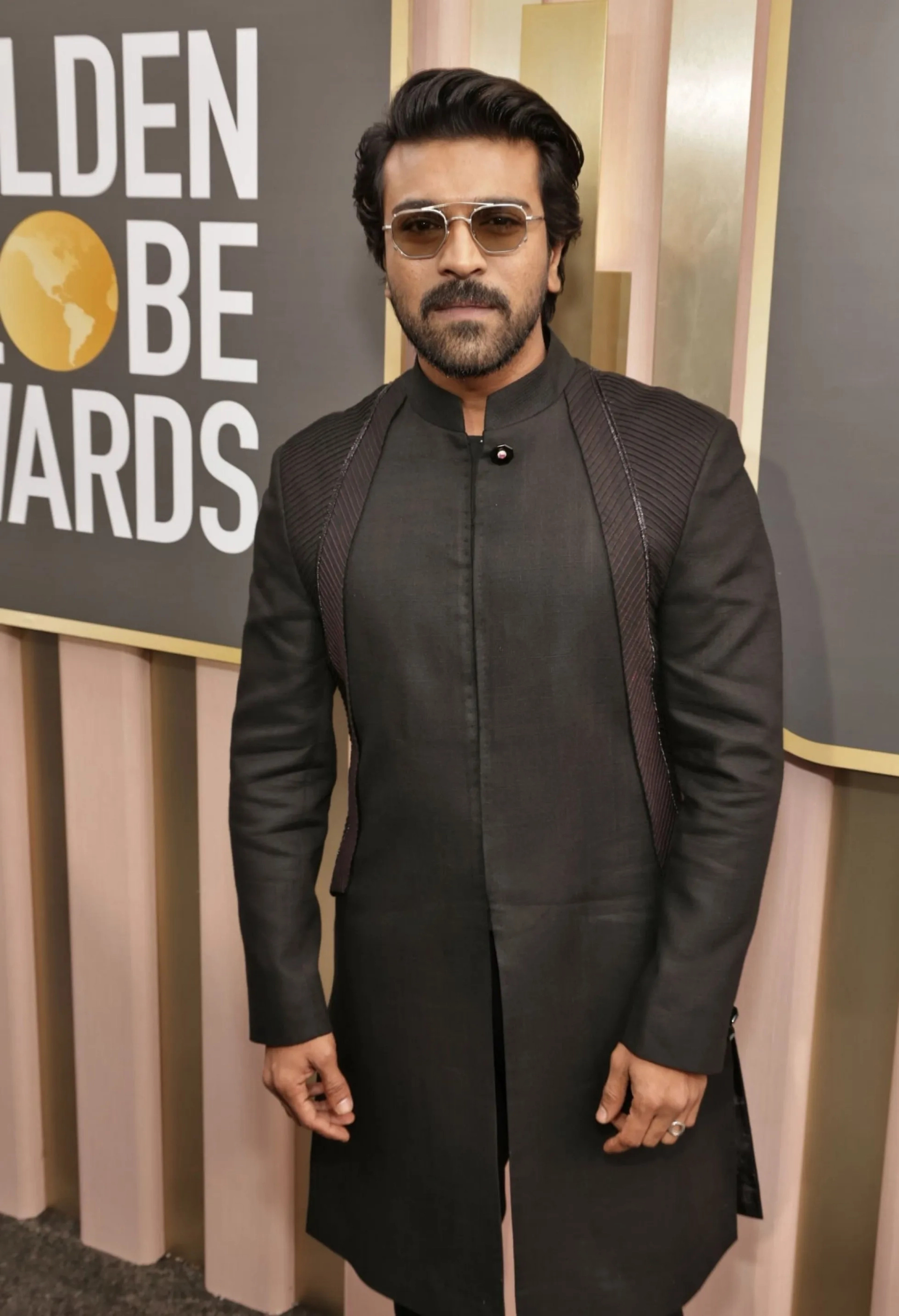 Ram Charan at an event for RRR (2022)