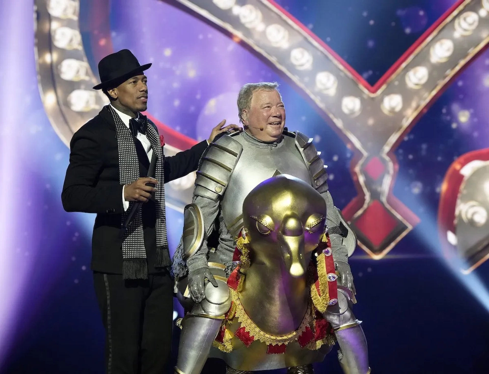 William Shatner and Nick Cannon in The Masked Singer: A Royal Season Premiere (2022)