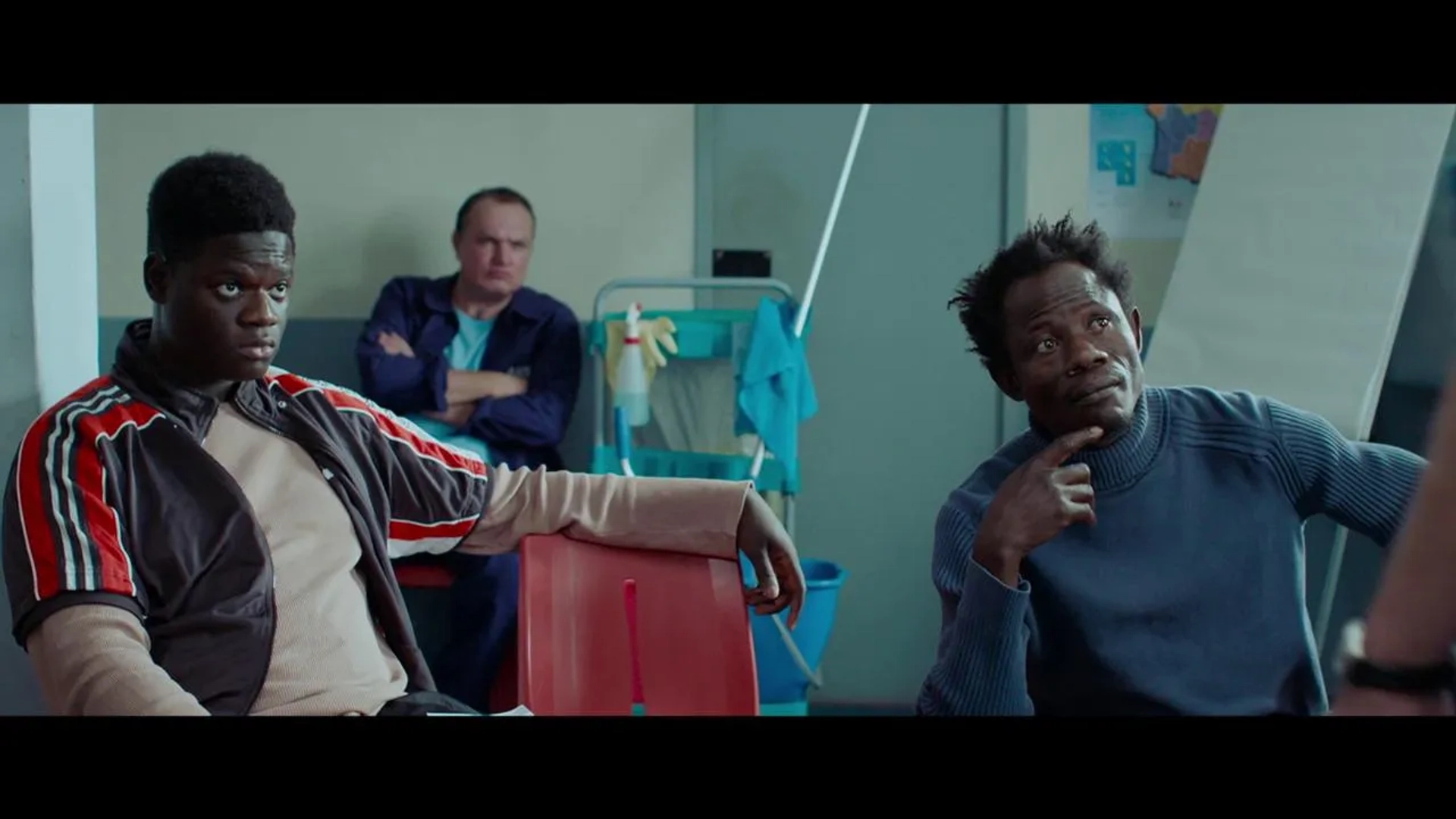 Aleksandr Medvedev, Lamine Cissokho, and Wabinlé Nabié in The Big Hit (2020)